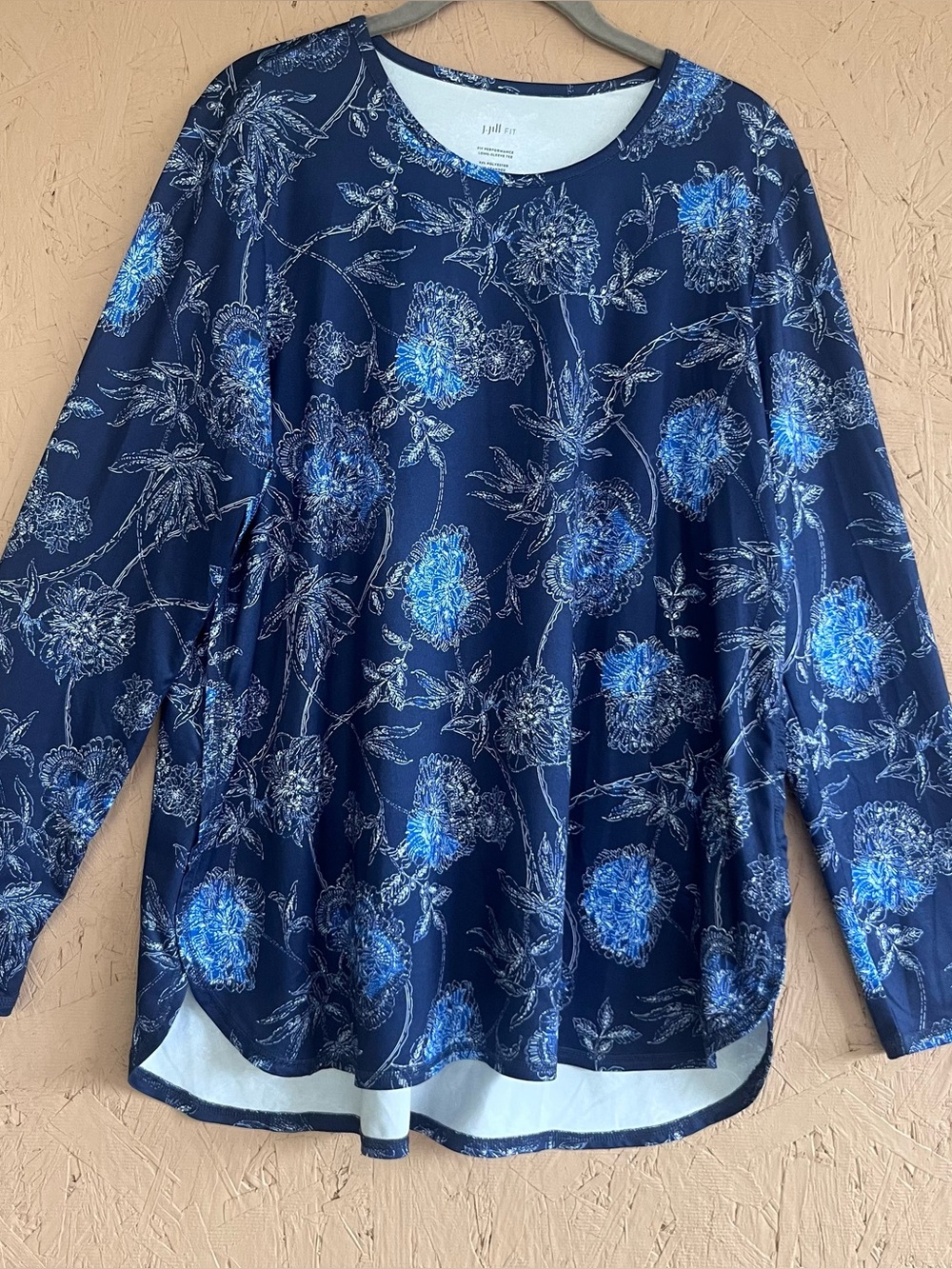 Jill blue floral long sleeve top with white floral print, size L.